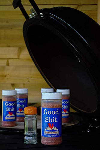 Big Cock Ranch bottle next to a hand demonstrating size and convenient countertop storage