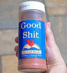 Big Cock Ranch shaker top with seasoning pouring to show easy sprinkle benefit