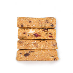 Big Spoon Roasters Cherry Pecan bar close-up highlighting nut butter richness