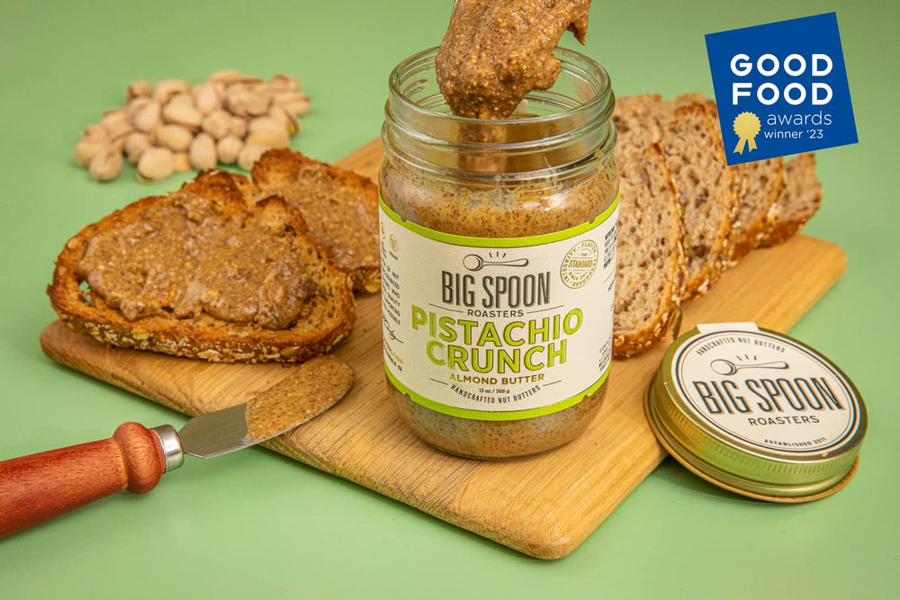 Big Spoon Roasters jar in hand to show 13-ounce size and portion convenience