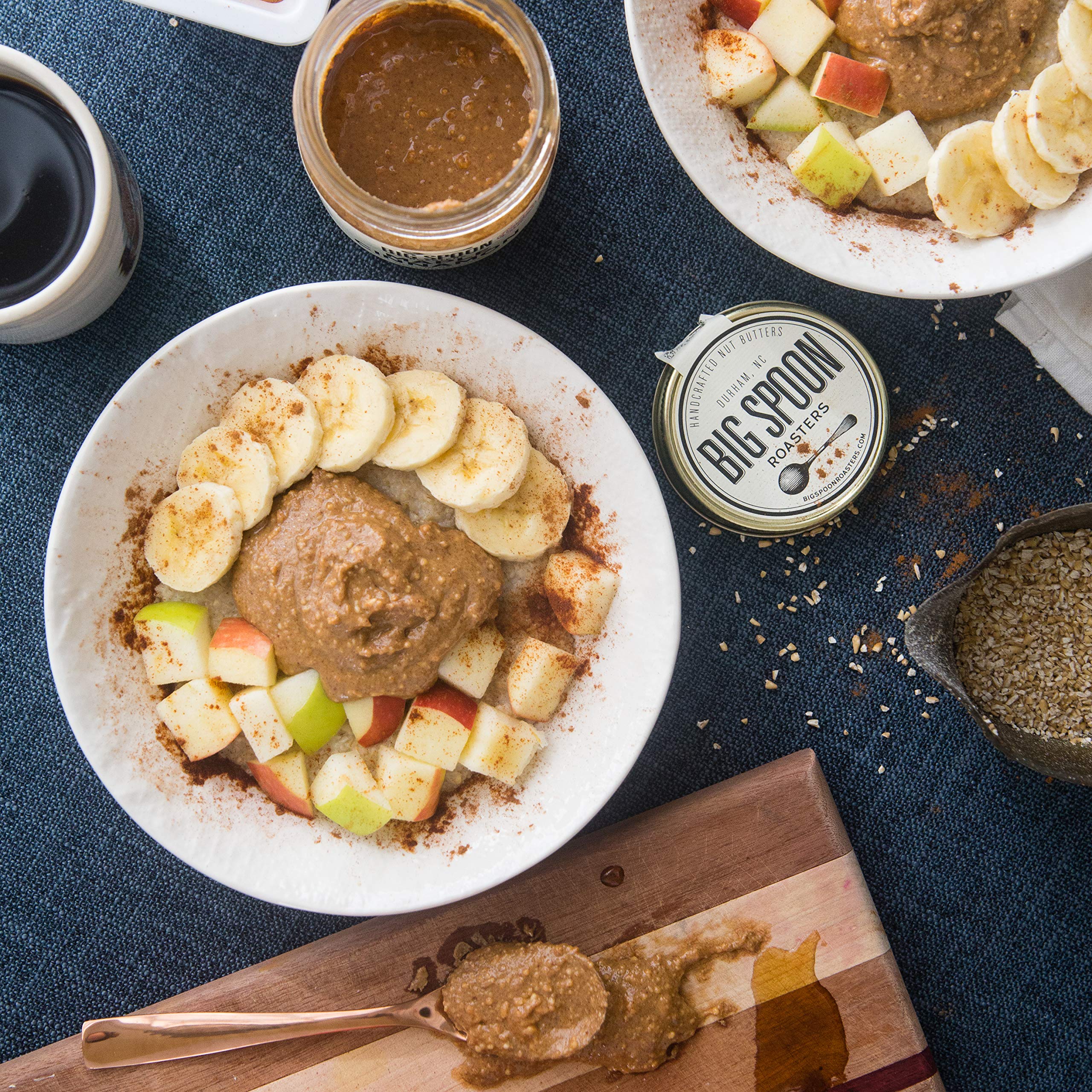 Big Spoon Roasters ingredients laid out—peanuts, pecans, maple syrup, cinnamon