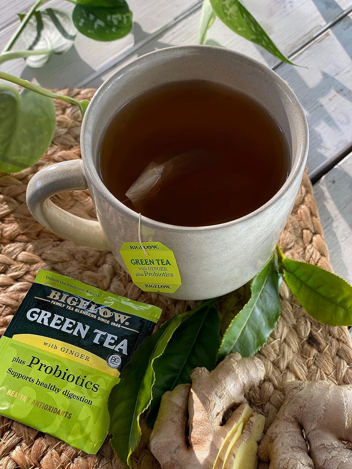 Bigelow Tea beside a cup for scale showing packet size and serving context