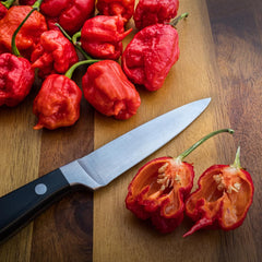 Birch & Meadow whole Carolina Reaper chiles in a kitchen bowl ready for rehydration and infusion