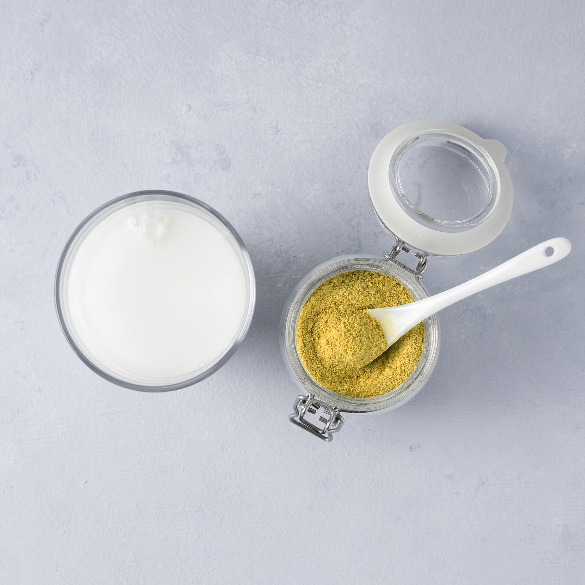 Birch & Meadow being stirred into sauce to add creamy umami