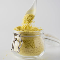 Birch & Meadow sprinkled on popcorn for savory, dairy-free boost