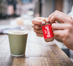 Biscoff biscuit beside a coffee cup illustrating perfect pairing