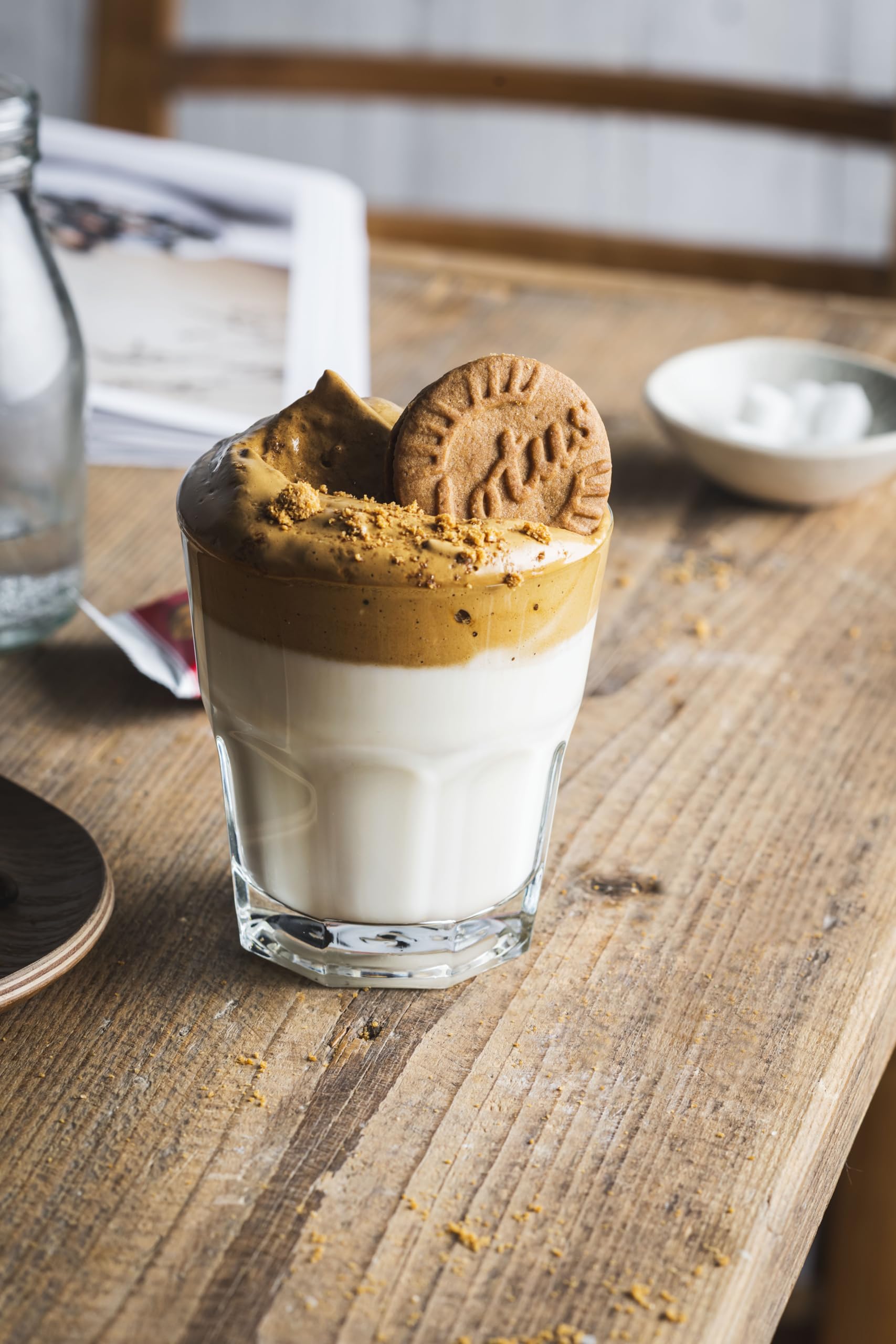 Biscoff cookies next to coffee cup showcasing an ideal pairing