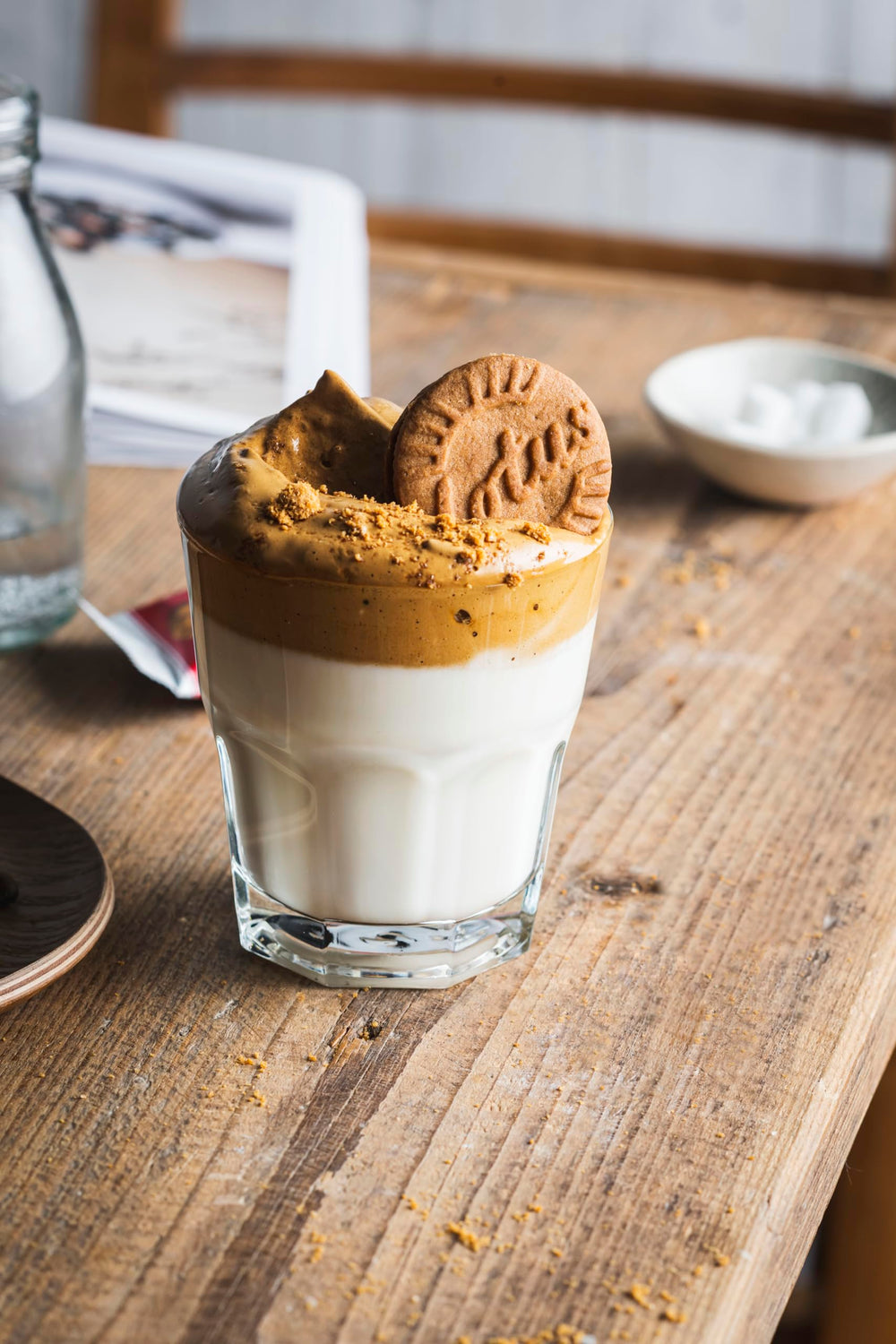 Biscoff cookies next to coffee cup showcasing an ideal pairing