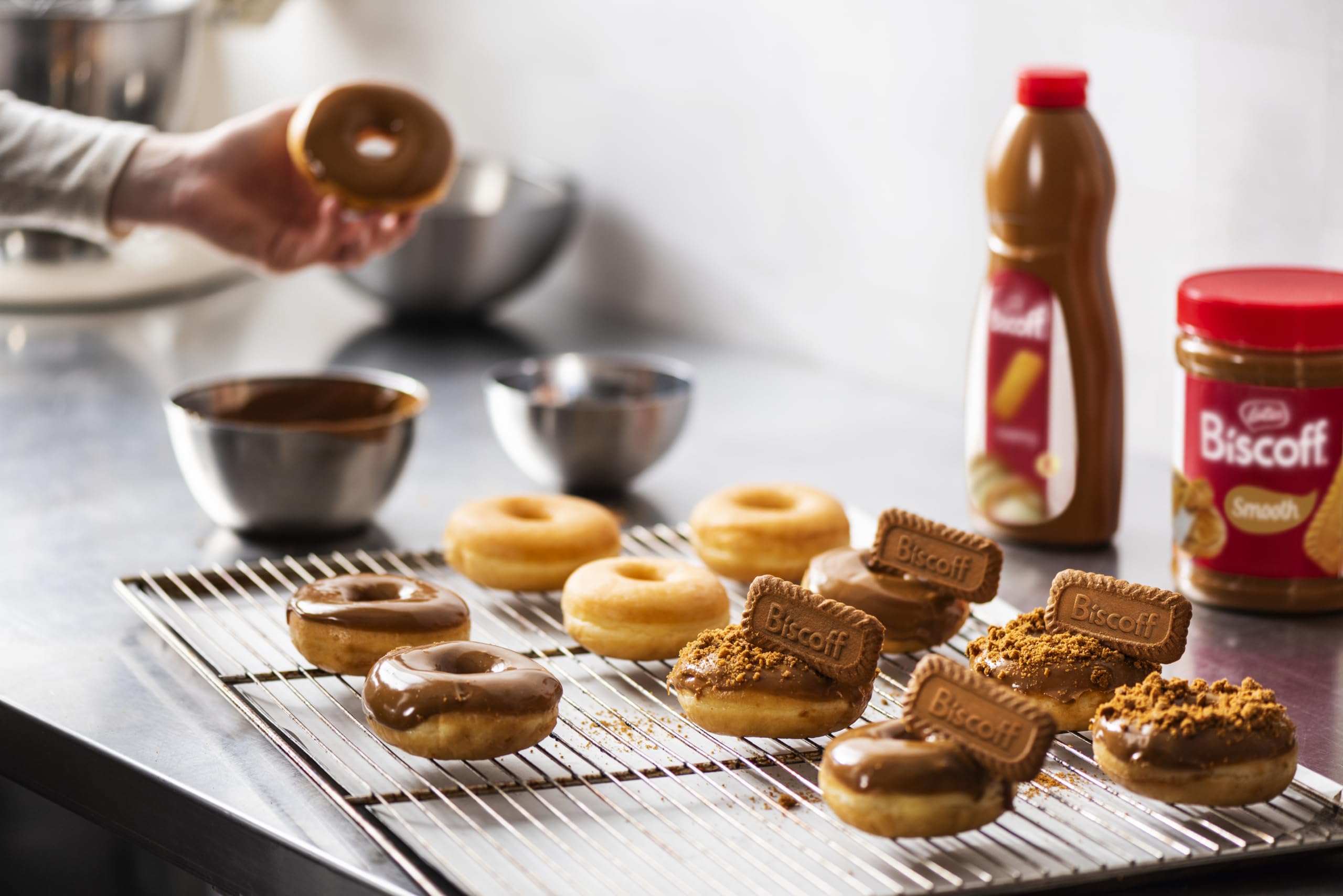 1L Biscoff bottle next to a coffee cup for scale and portion convenience
