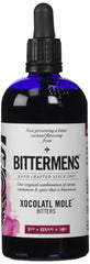 Bittermens Xocolatl Mole bottle front view showing label and serving suggestion benefit