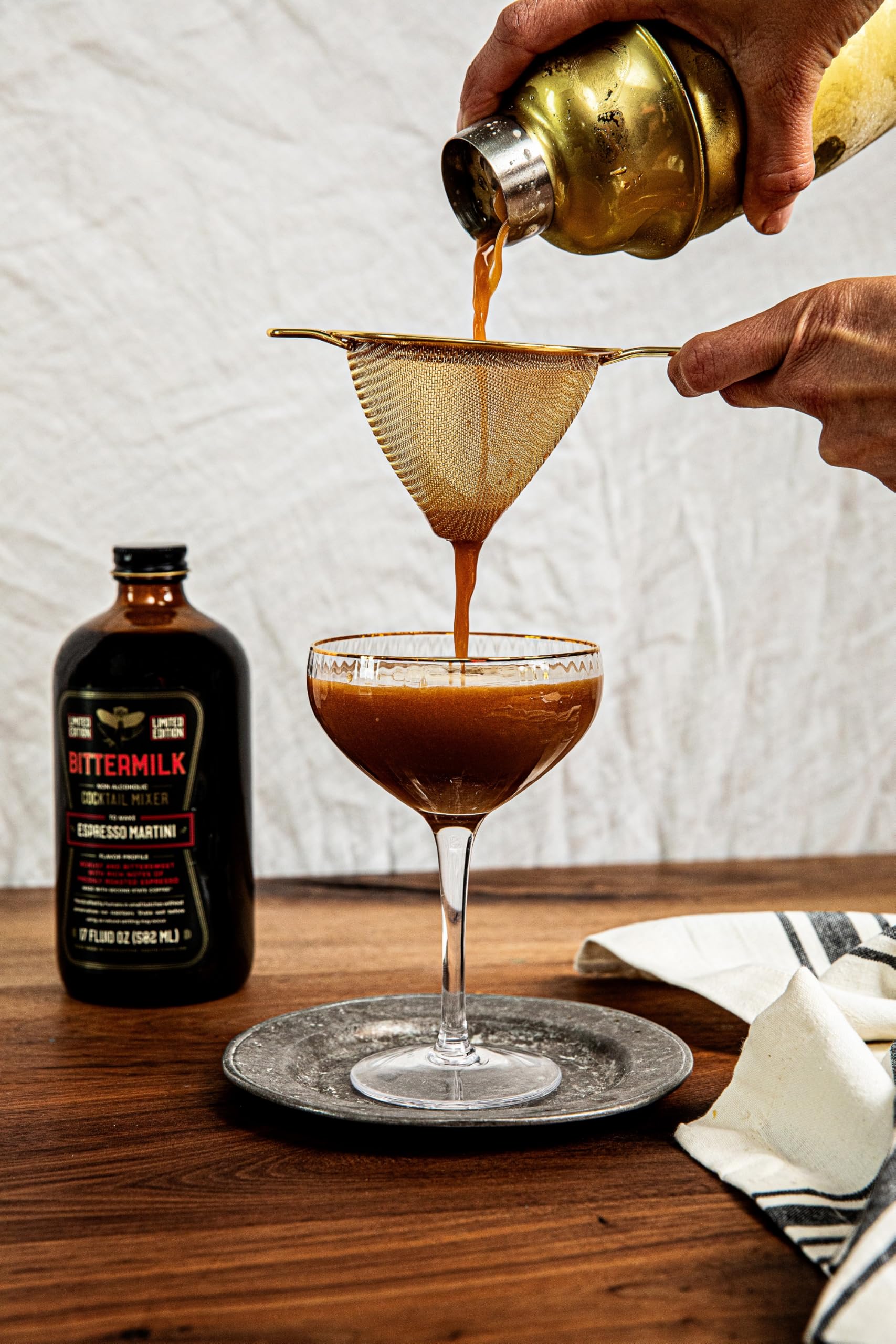 Bittermilk bottle on bar setup conveying ease for bartenders