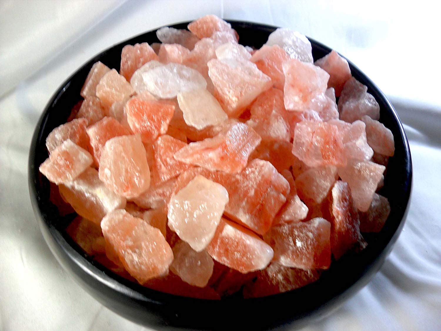 Black Tai Salt Co. spa bowl with crystals for aesthetic wellness display