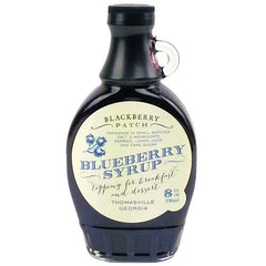 Blackberry Patch bottle front label showing blueberry syrup and natural ingredients