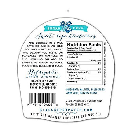 Blackberry Patch 12 oz bottle next to measuring cup showing compact size