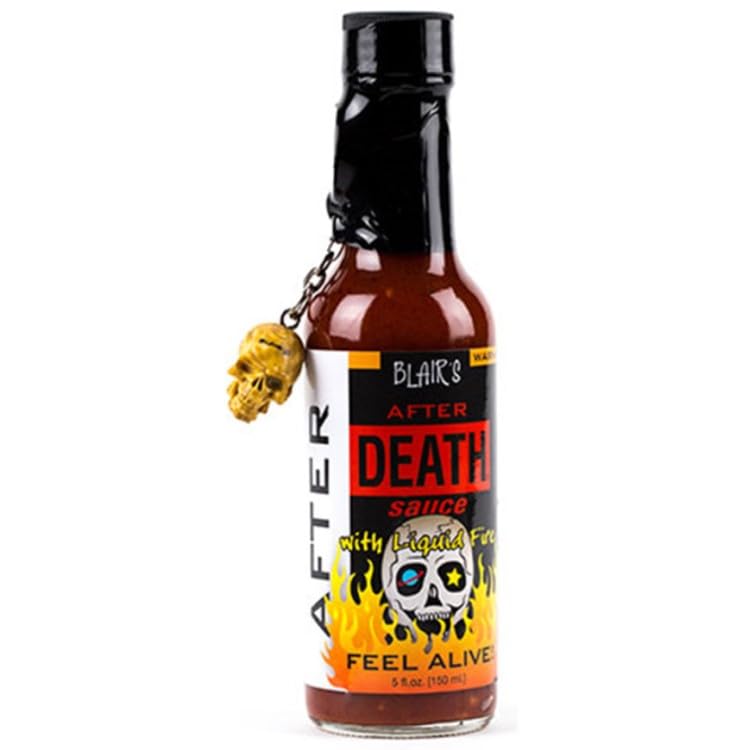 Blair's sauce drizzled on wings demonstrating fiery flavor boost and serving suggestion