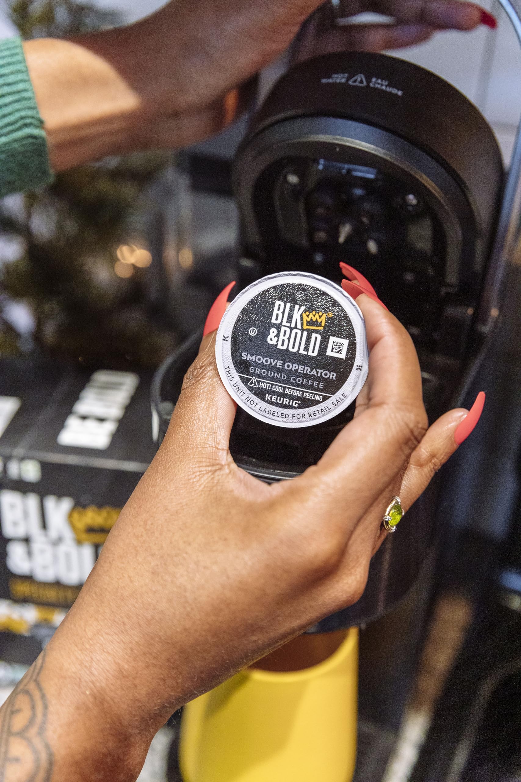 BLK & Bold brewed cup pouring from pod, presents rich dark-roast appearance
