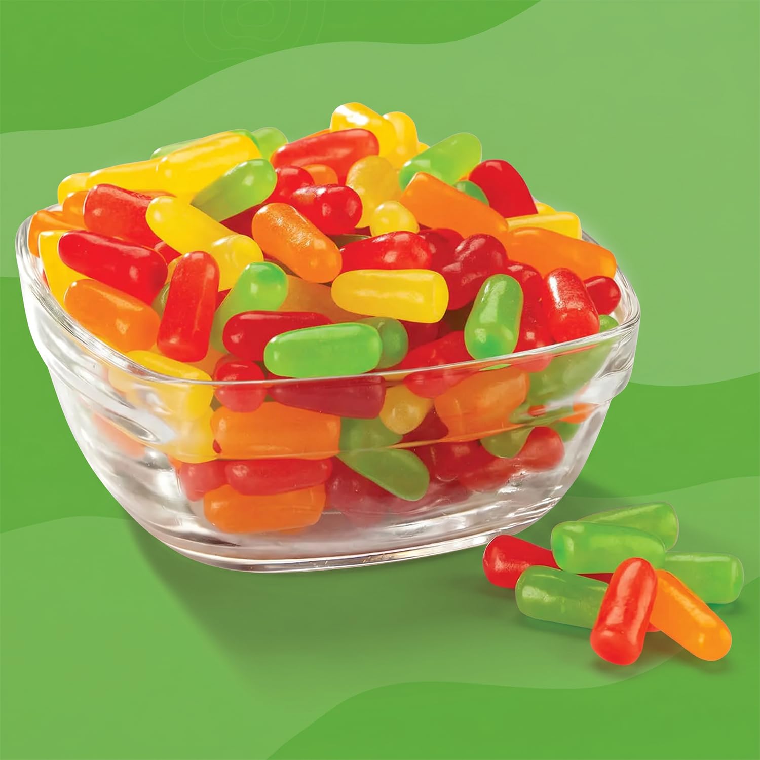 Bloom's candy beside a hand to show portion and scale convenience