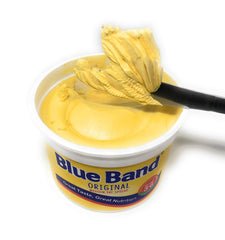 Blue Band opened tub showing creamy contents and freshness preservation