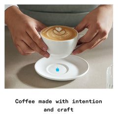 Blue Bottle Coffee bag beside kitchen scale demonstrating 12 oz portion