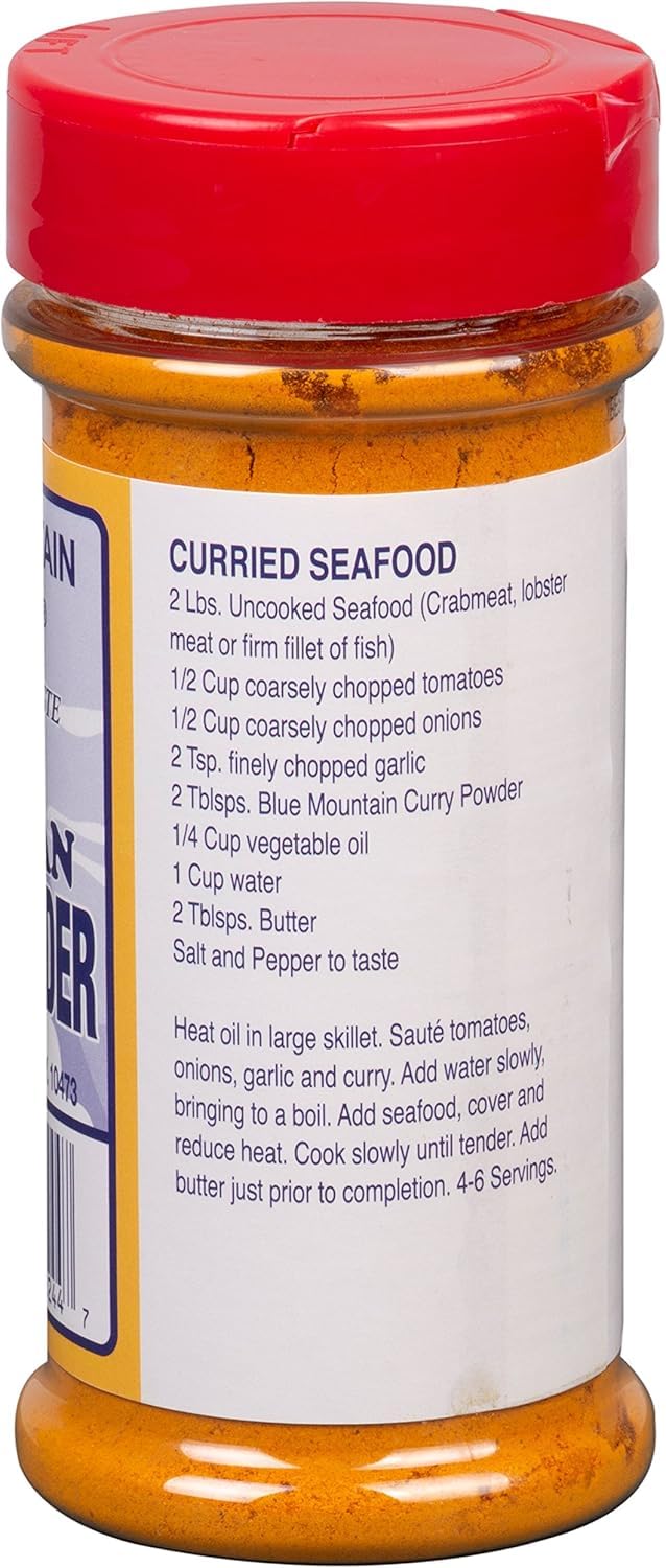 Blue Mountain Country bottle staged in kitchen lifestyle scene inspiring Caribbean meals