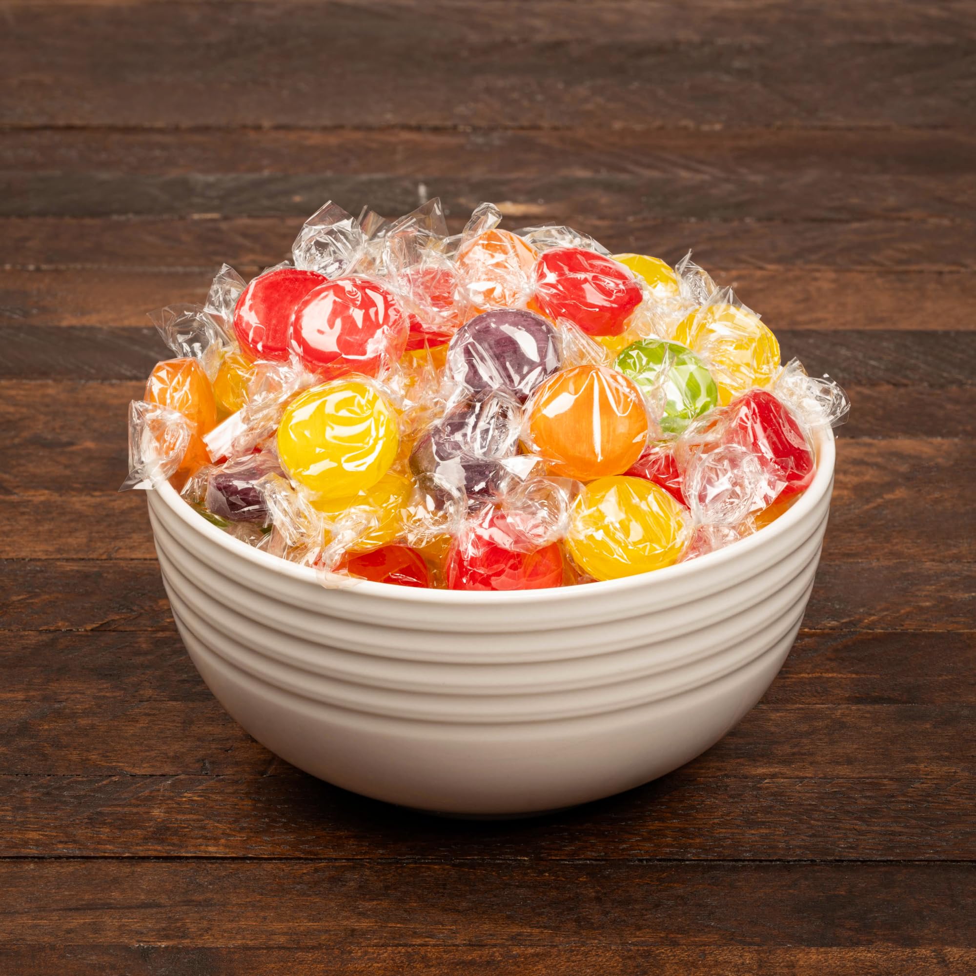 Blunon close-up of glossy candy discs highlighting texture and color for appealing bite