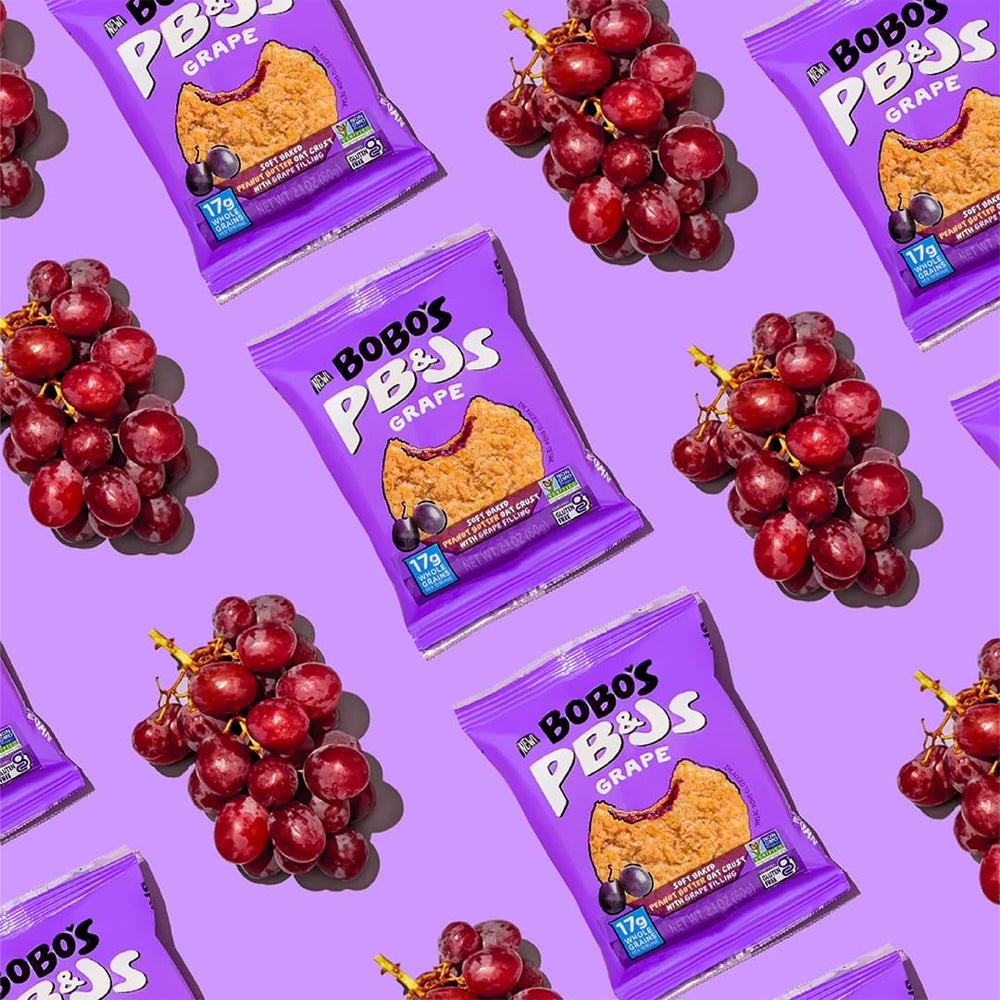 Bobo's individually wrapped bars in hand demonstrating portable, grab-and-go convenience