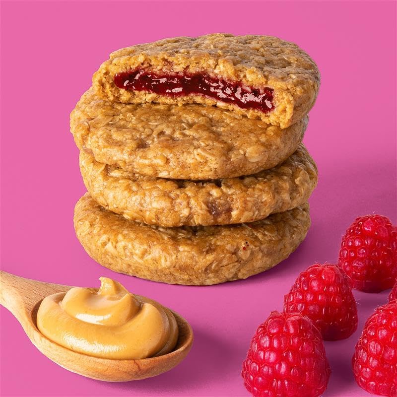 Bobo's unwrapped single raspberry PB&J bar revealing jam center for quick energy