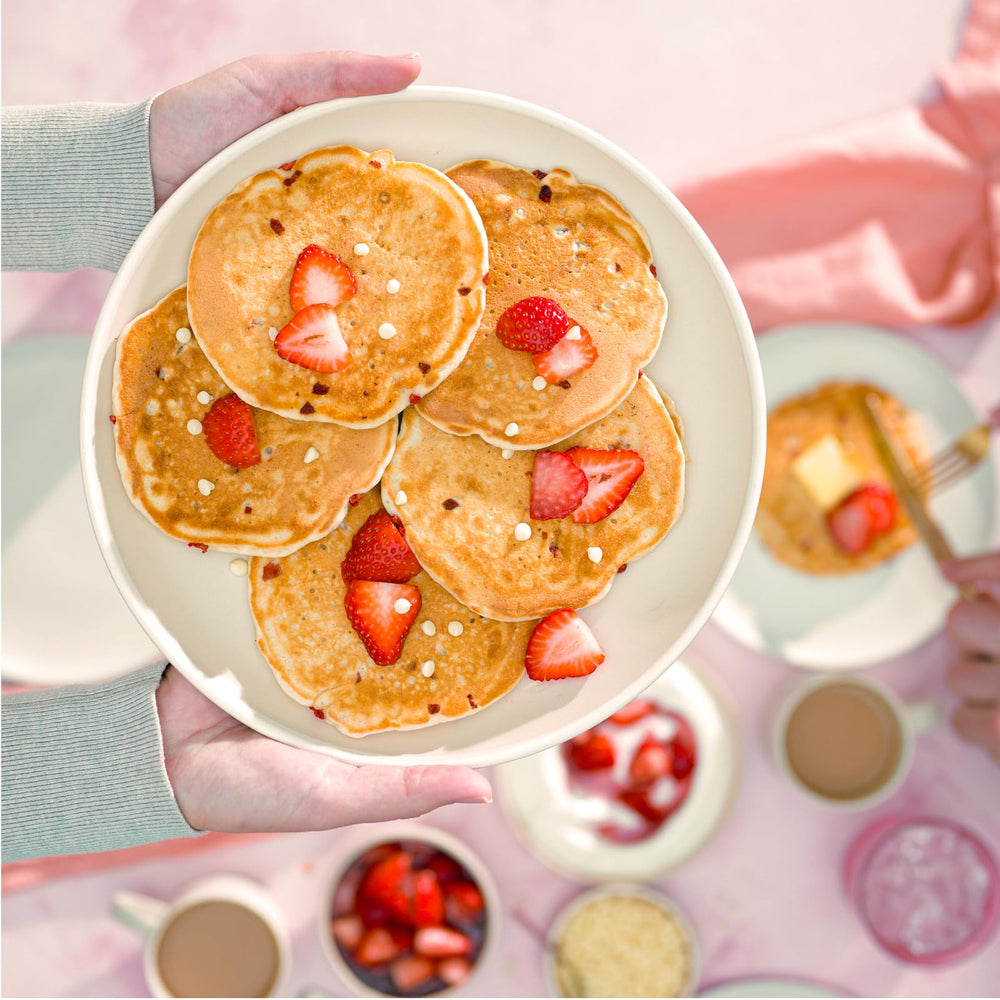 Bob's Red Mill plated pancakes on a breakfast table, illustrating brunch-ready presentation