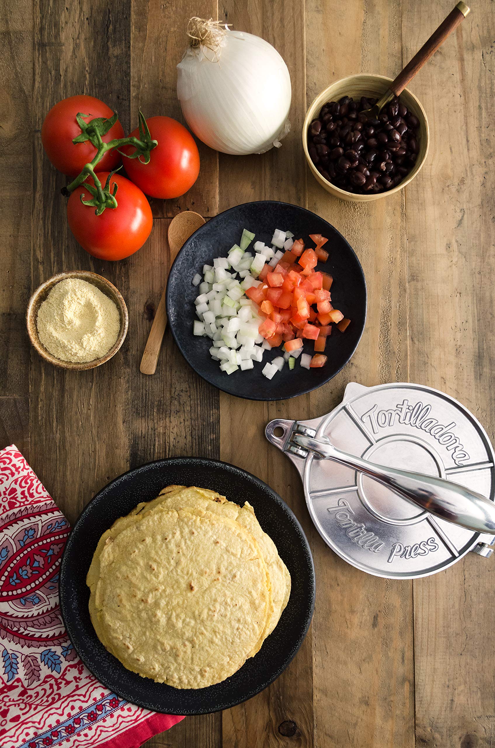Bob's Red Mill tortilla press with dough, fast homemade tortillas benefit