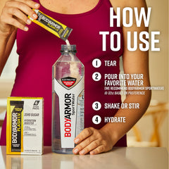 BODYARMOR pouring stick into water bottle for convenient hydration