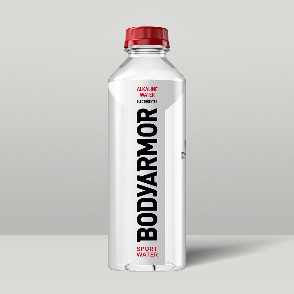 BODYARMOR bottle in outdoor scene showing portable hydration advantage