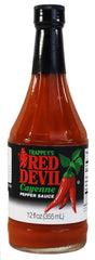 Boiyiklonn Trappey's Red Devil pour closeup highlighting smooth texture and controlled drizzle benefit