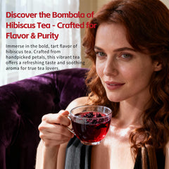 Bombala brewed hot cup displaying deep red color and aromatic steam