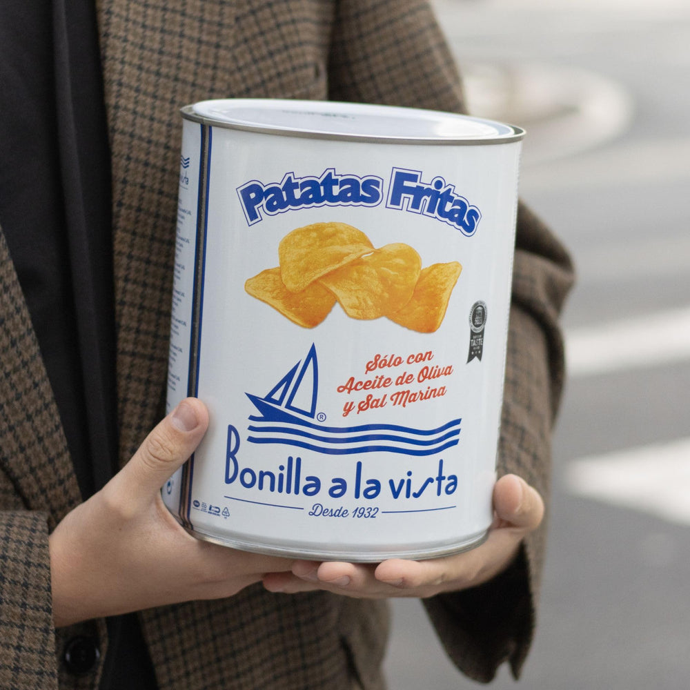 Bonilla a la Vista chip in hand highlighting thin slice and satisfying crunch benefit