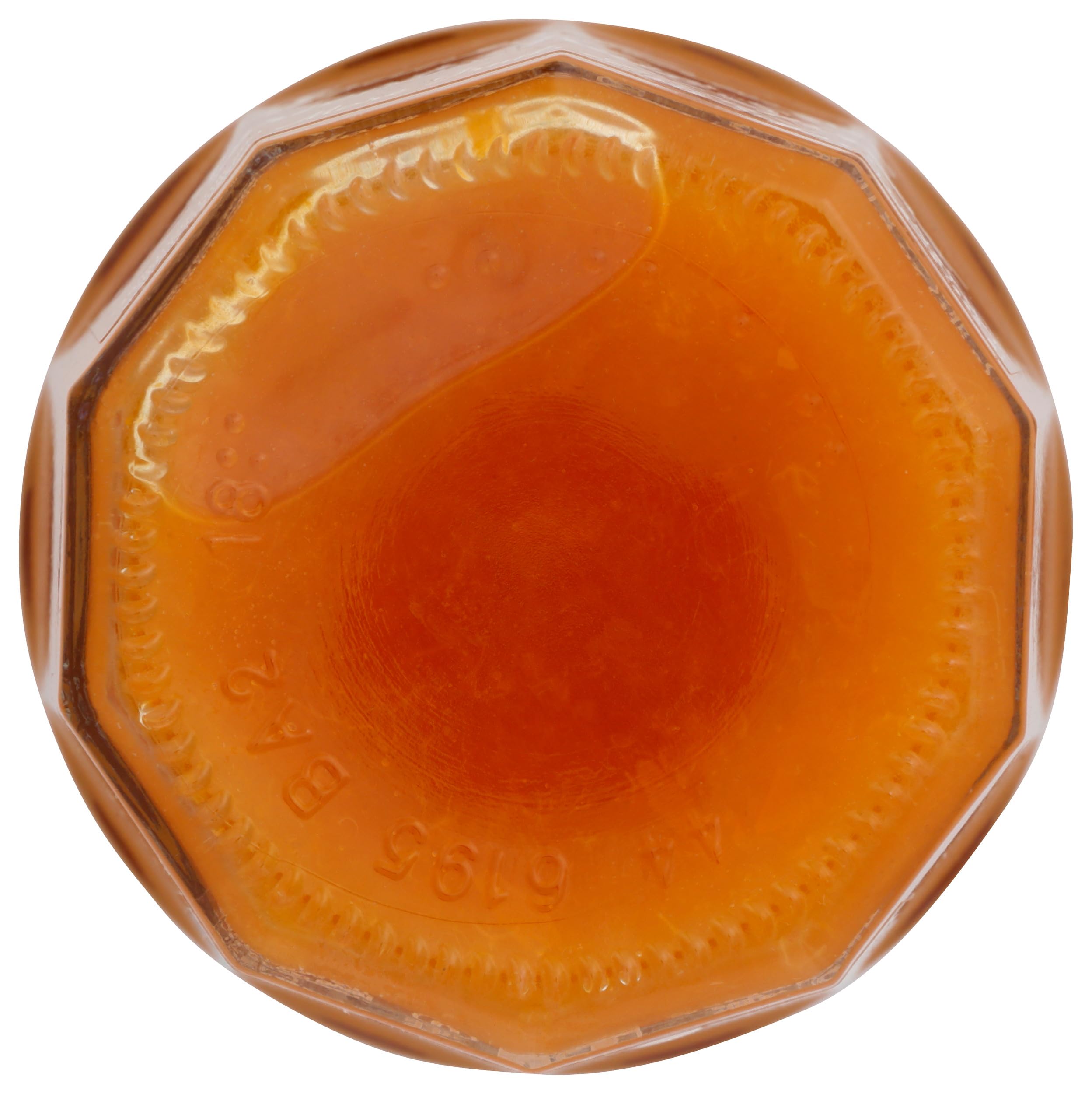 Bonne Maman apricot jar next to spoon for scale and portion suggestion