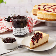 Bonne Maman cherry preserves on a spoon highlighting spreadable texture and richness