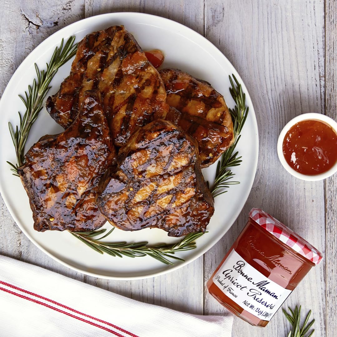 Bonne Maman cherry preserve spooned over toast illustrating rich color and versatile serving idea