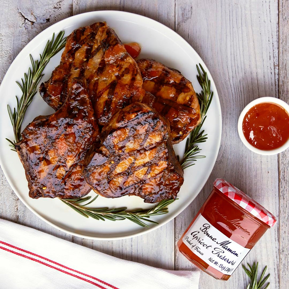Bonne Maman cherry preserve spooned over toast illustrating rich color and versatile serving idea