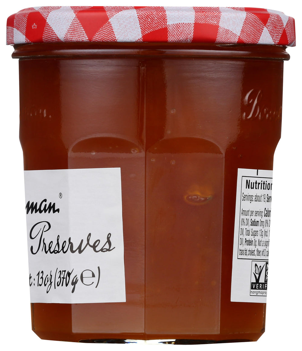 Hand holding Bonne Maman 13 oz jar to show scale, portable pantry-friendly size