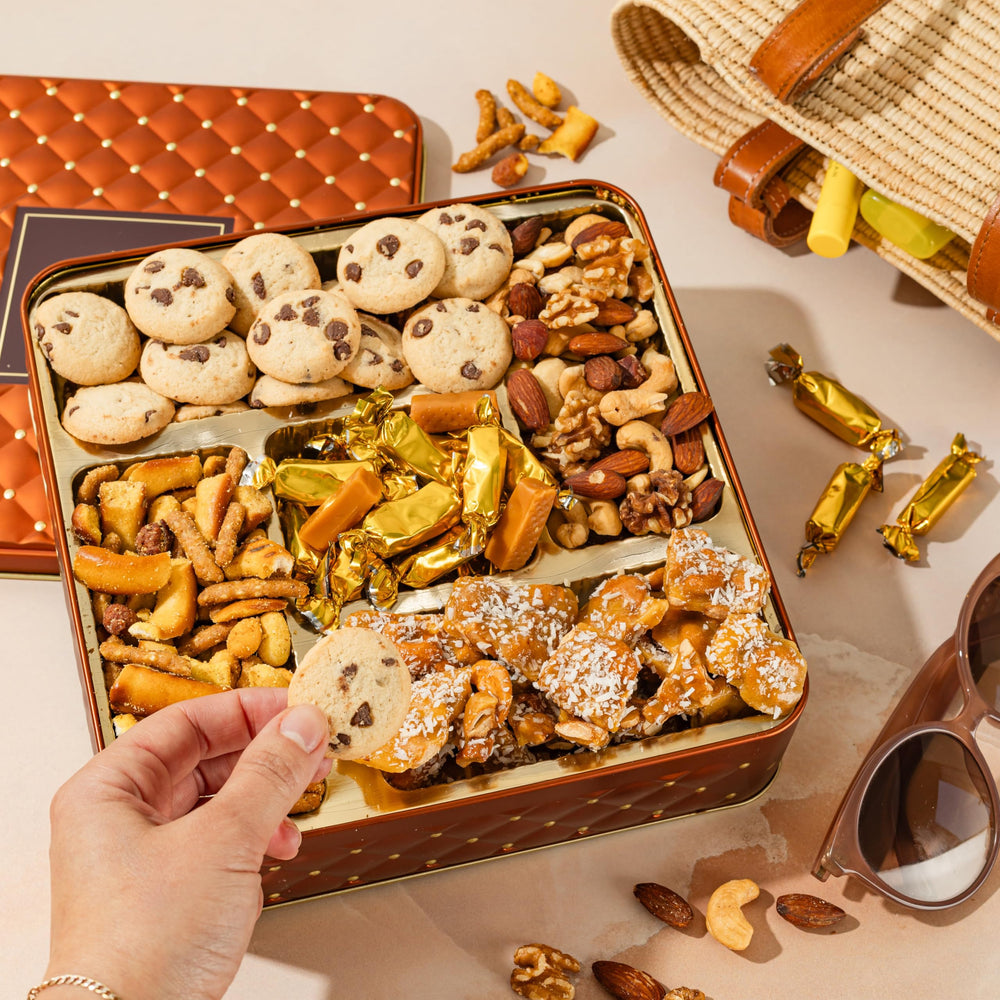 BONNIE AND POP open tin with snacks in a living room setting showing ready-to-share convenience