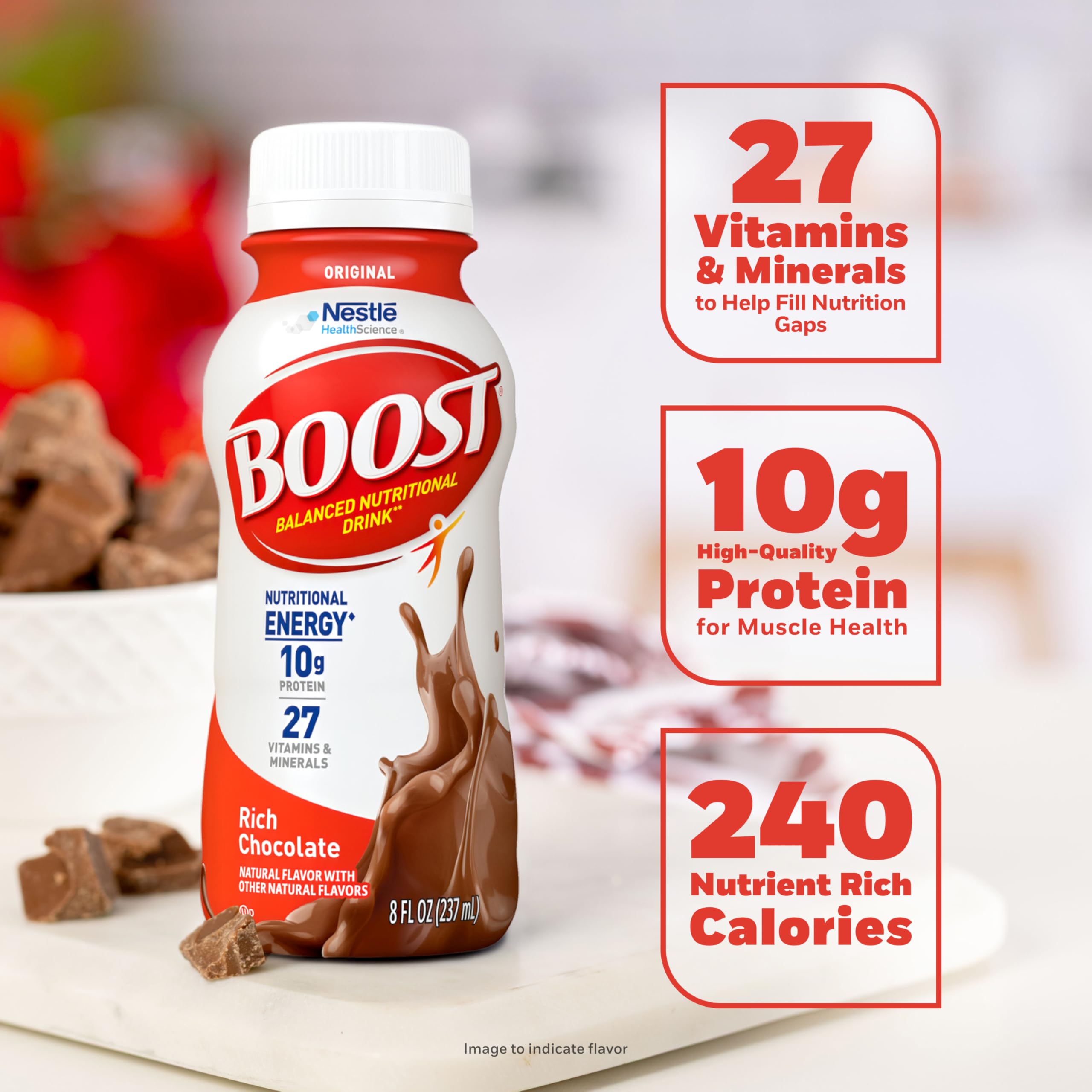 BOOST bottle held in hand to show 8 fl oz scale and portability benefit
