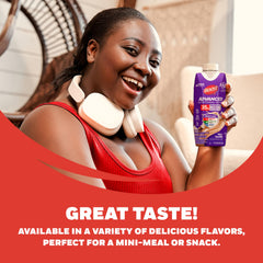 BOOST carton in hand showing size and portability for on-the-go nutrition