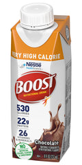 BOOST bottle beside a glass to show 8 fl oz serving size