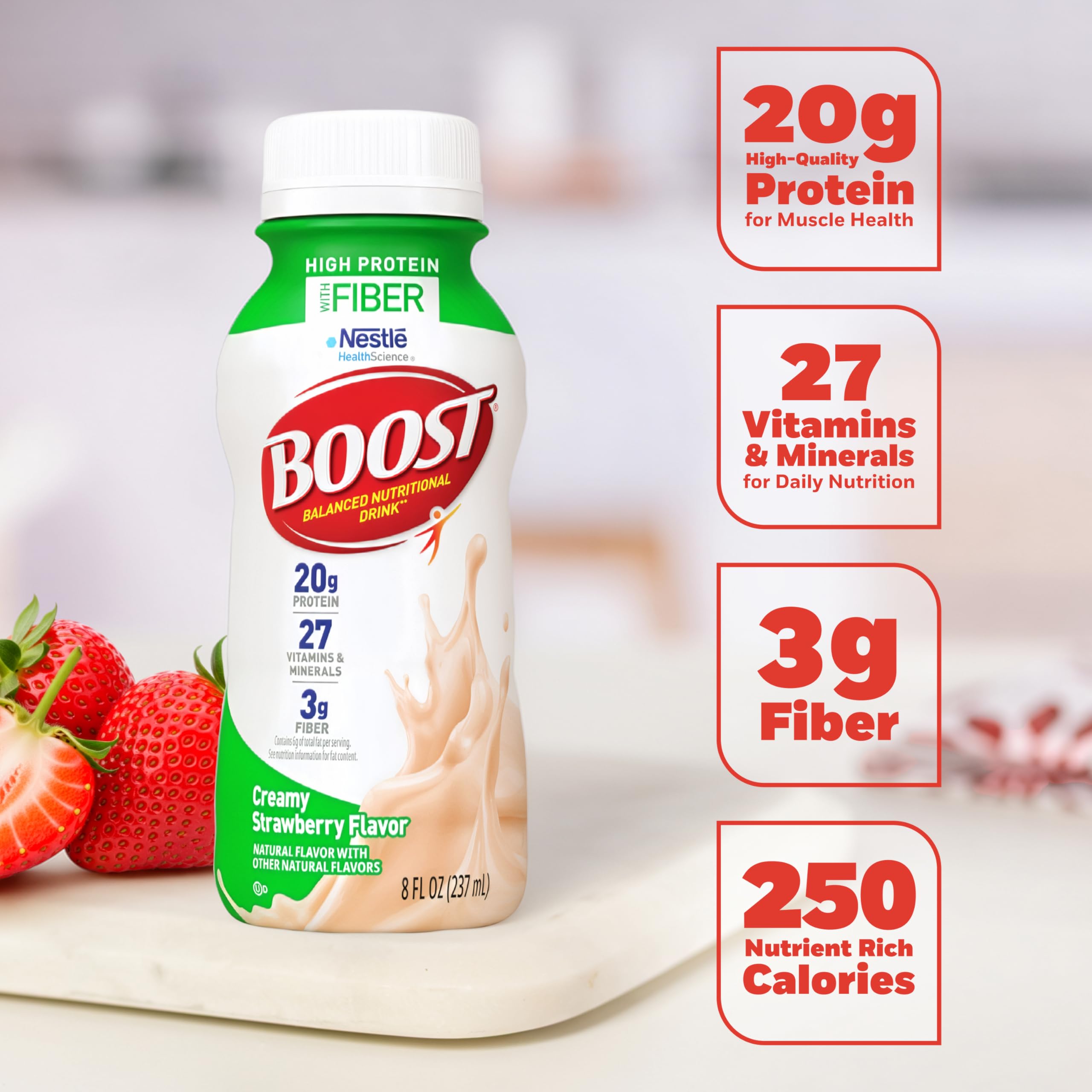 BOOST next to a coffee mug for size scale and grab-and-go convenience