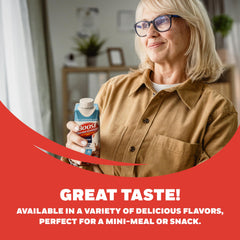 BOOST pouring into glass to show serving size and smooth consistency for meals