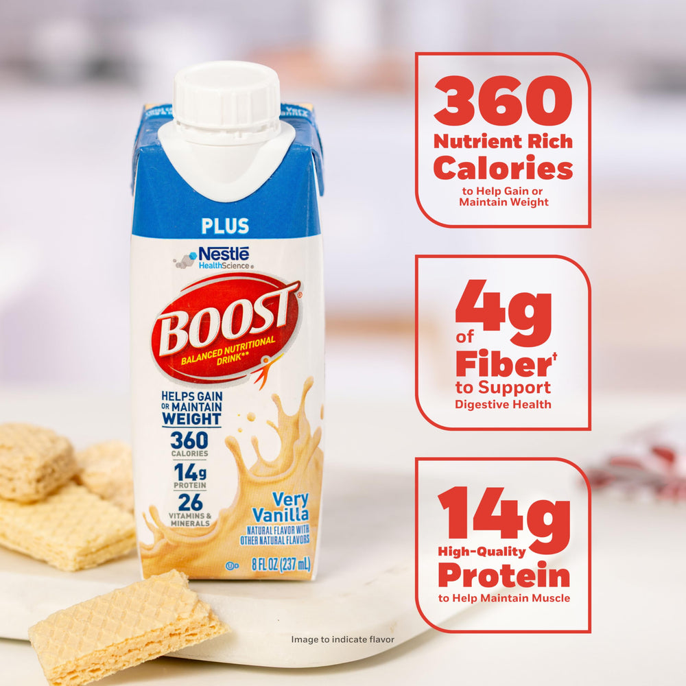 BOOST single served carton beside a glass to show portion and easy drinking
