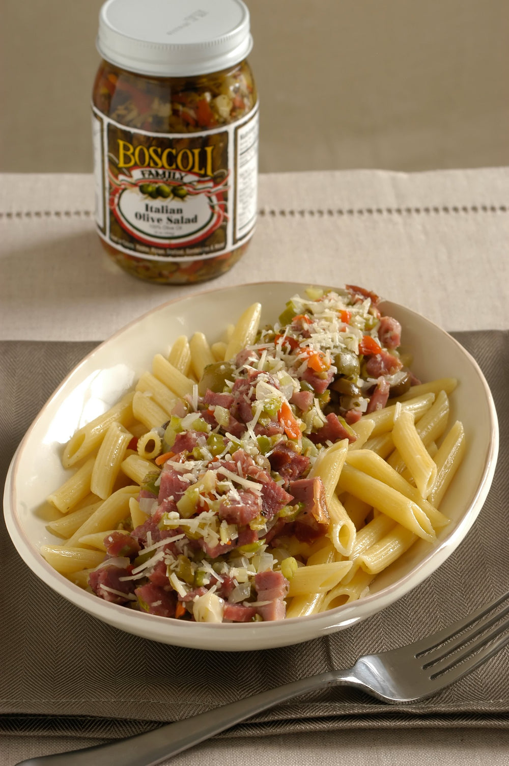 Boscoli Family olive salad stirred into pasta to boost savory taste