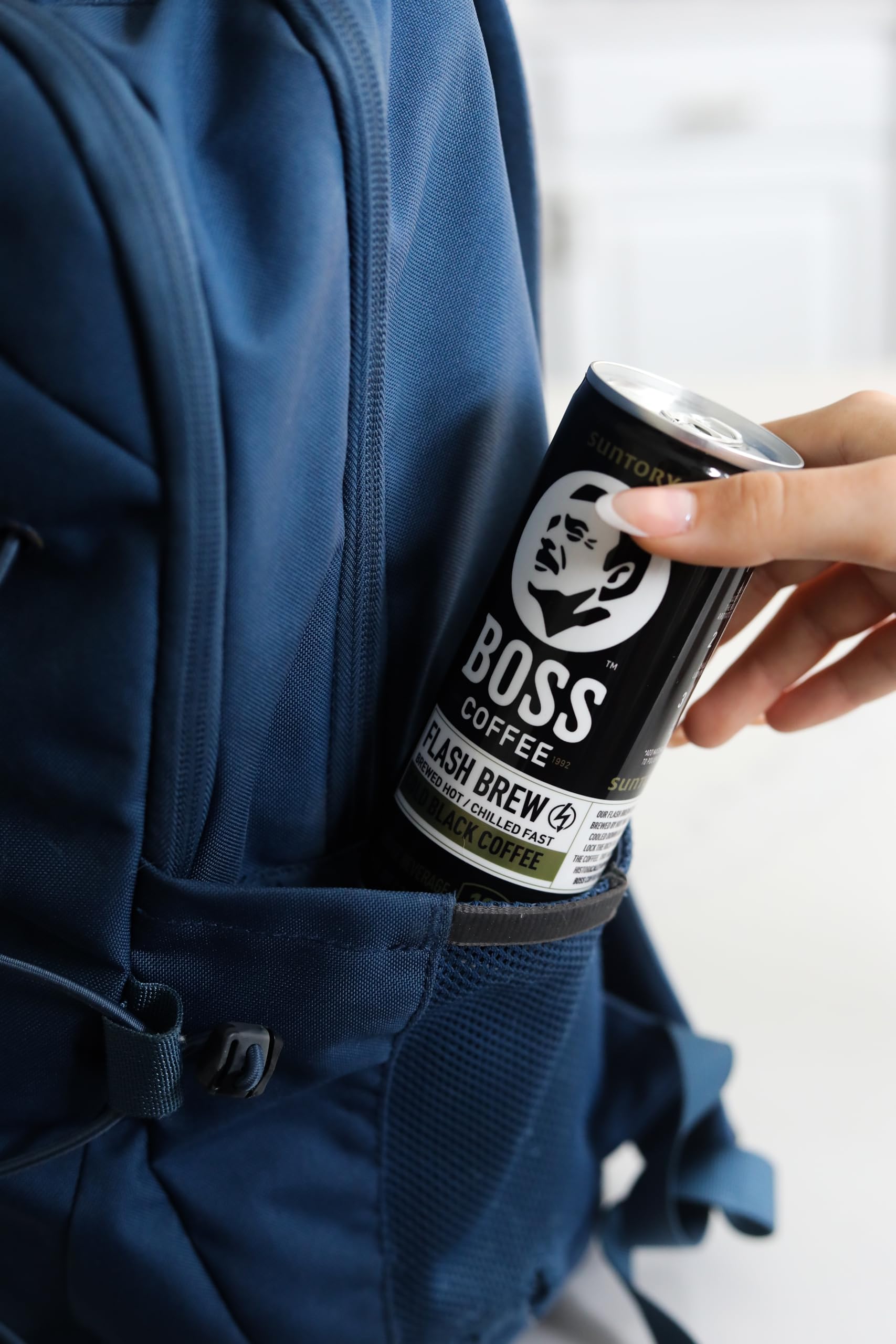 BOSS coffee lifestyle commute drink showing portable energy on the go