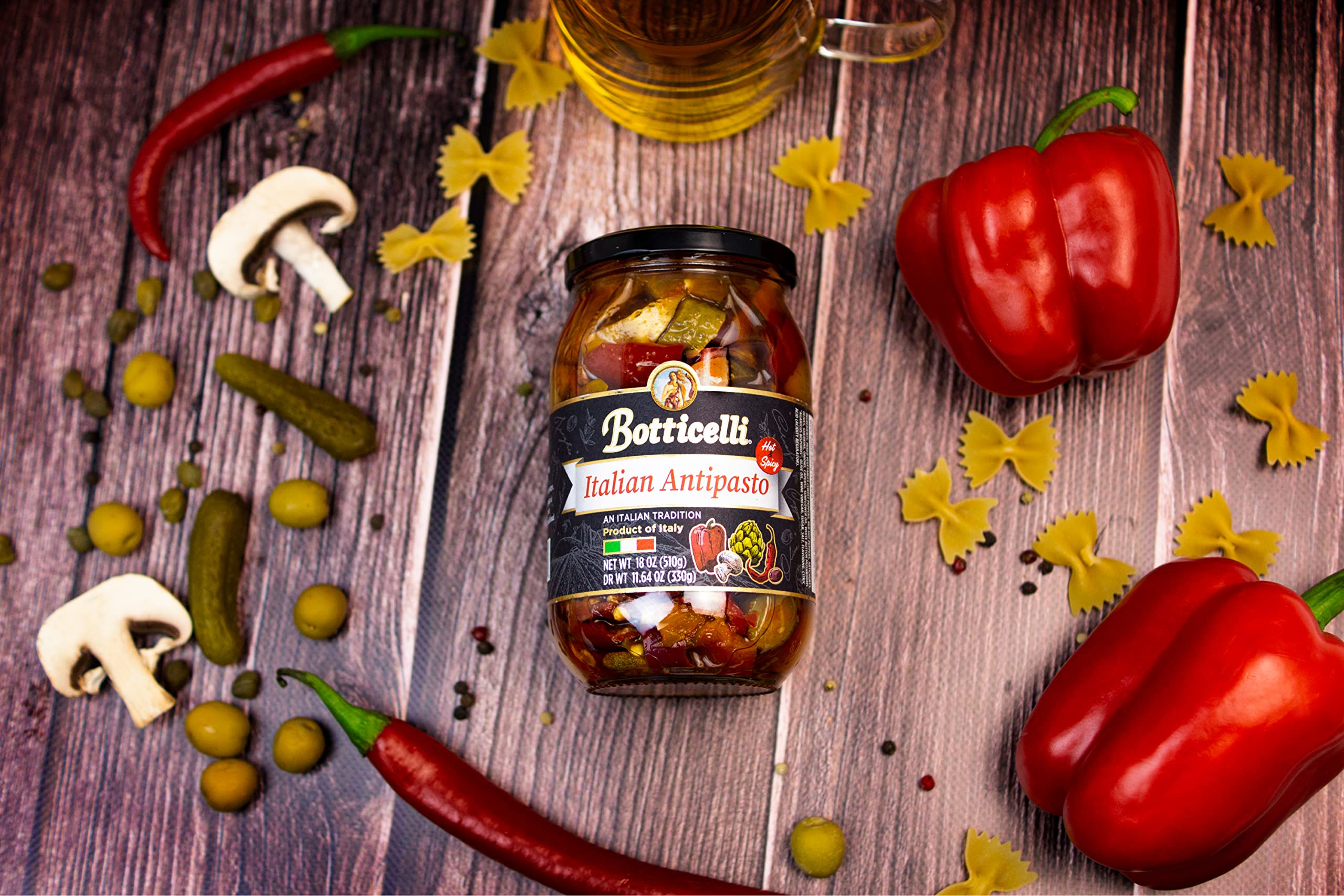Botticelli raw ingredients staged with olives and peppers, highlighting authentic Italian flavors