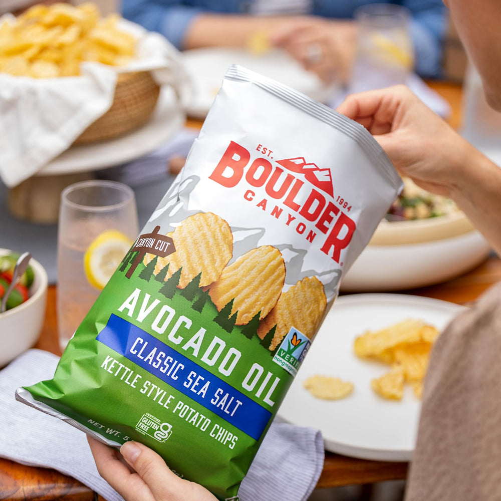 Boulder Canyon chips arranged on wooden plate showcasing crunchy serving idea